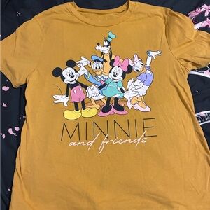 A Disney shirt labeled “Minnie’s and friends” with the characters in the front.